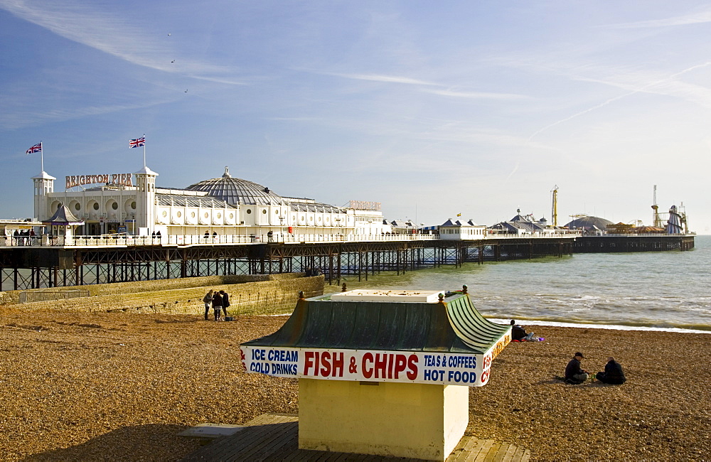 Fish and chip shop on beach by Brighton Pier on the South Coast of England, United Kingdom