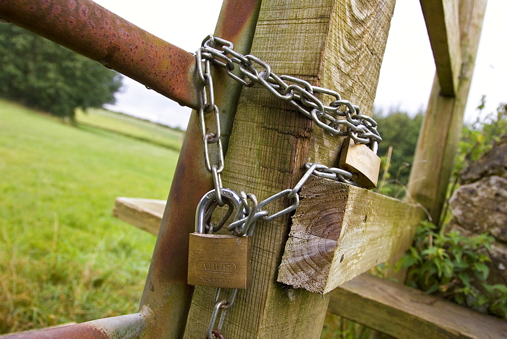 Gate locked with padlocks and a chain, Oxfordshire, United Kingdom