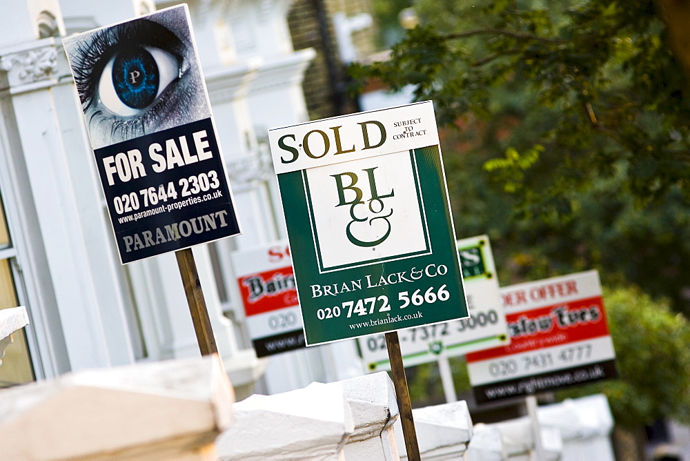 For Sale and Sold signs, West Hampstead, London, UK