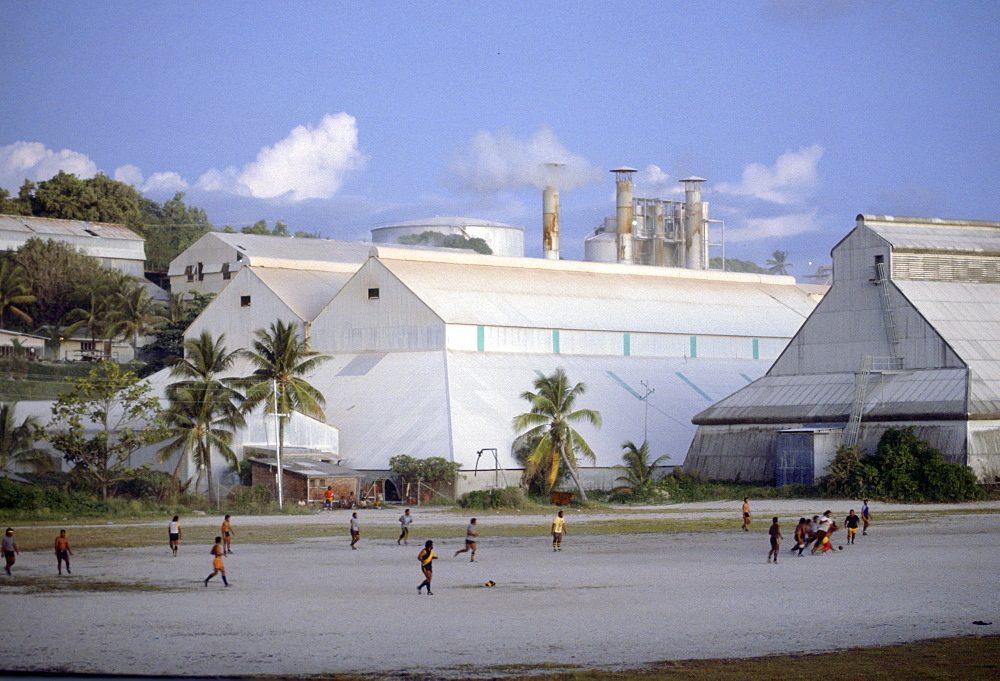 Men play Australian rules football in Nauru, South Pacific