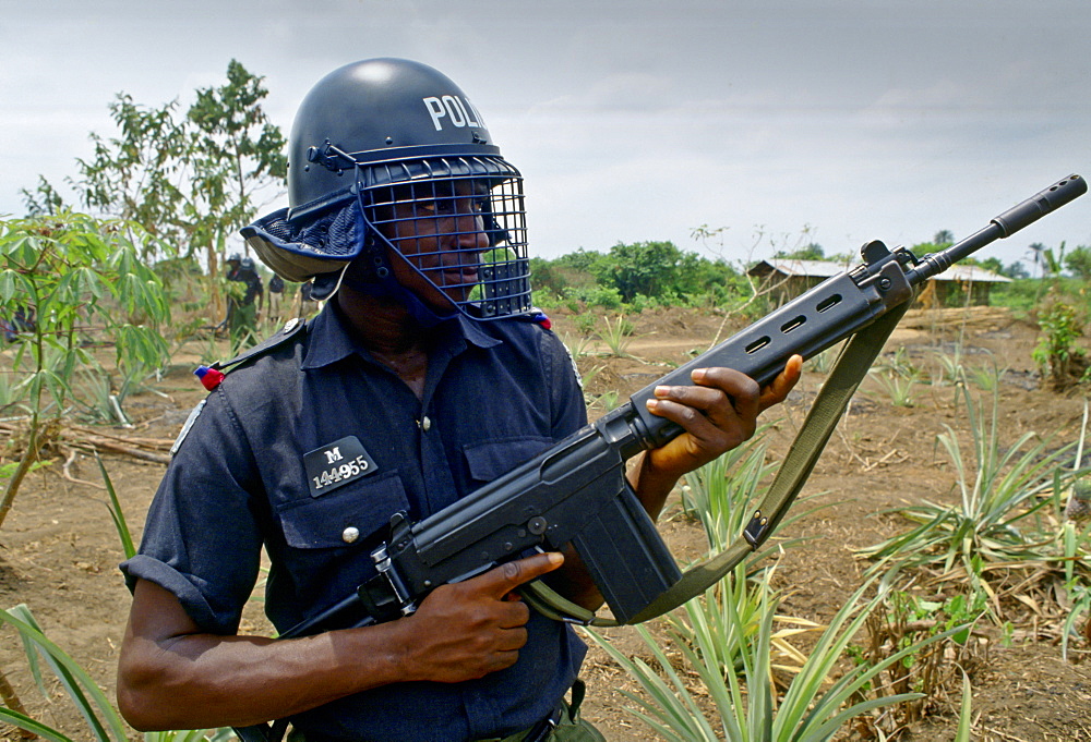 An armed policeman, Nigeria, Africa