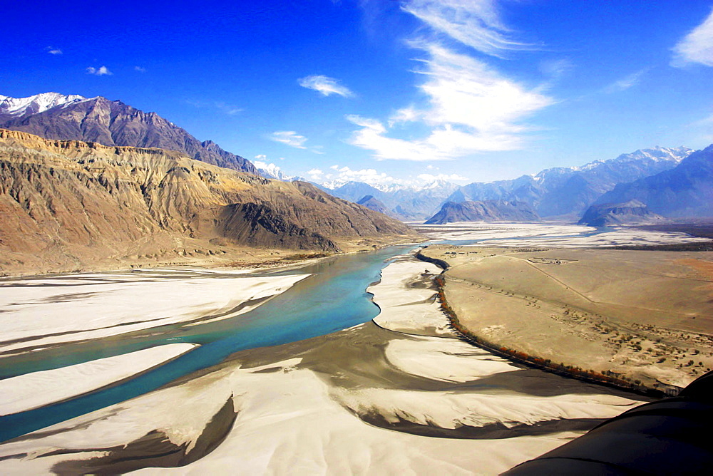 River runs through valleys of Karokoram Mountains, Skardu Valley, North Pakistan