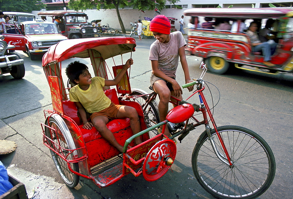 Children on rickshaw, Manila, Philippines