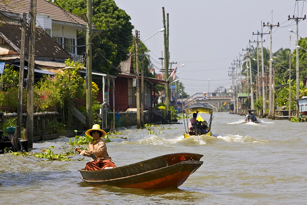 Woman in a boat, Bangkok, Thailand