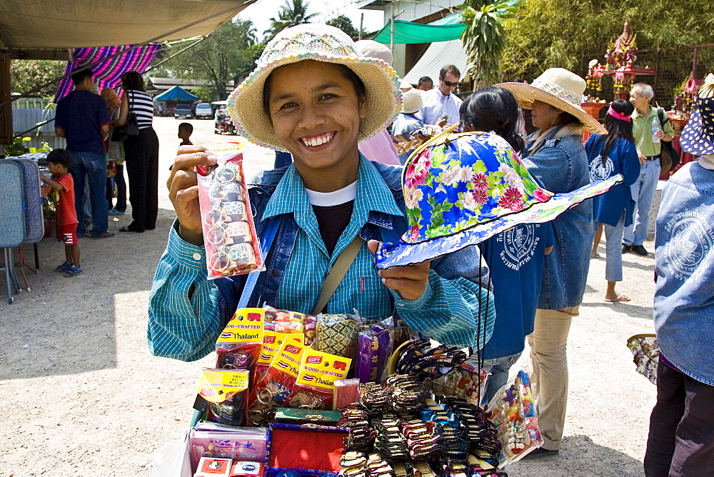 Trader by the Damnern Saduak floating market in Bangkok, Thailand