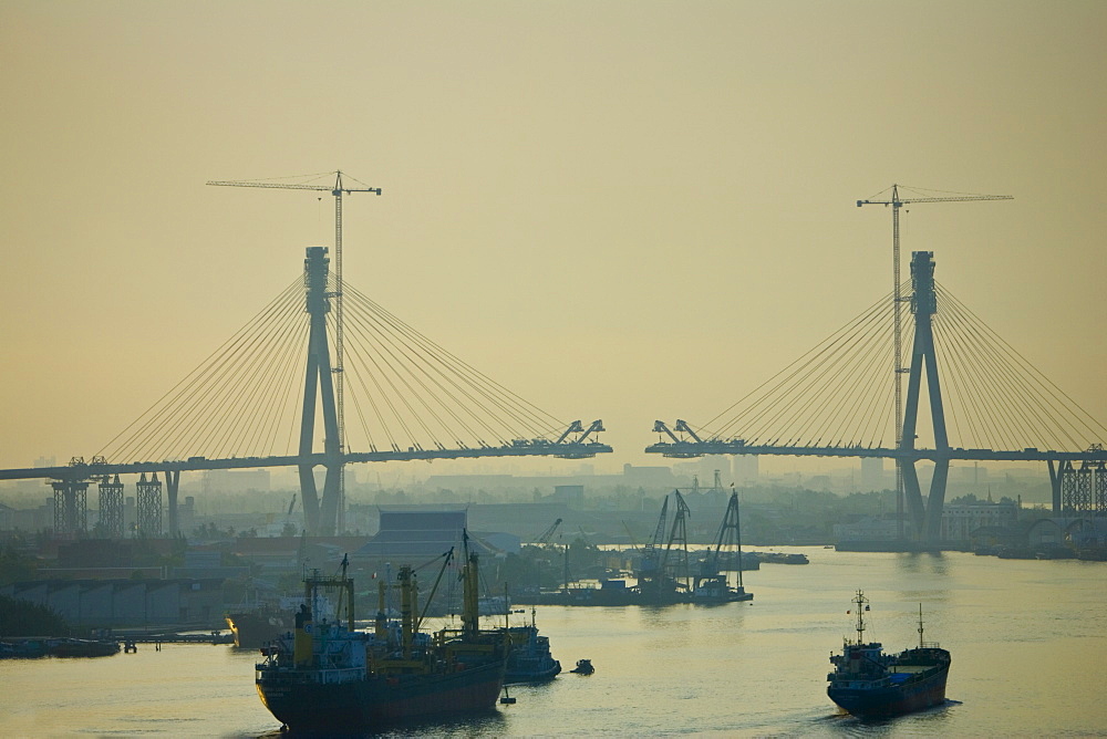 Cantilever bridge being built over the Chaophraya River, Bangkok, Thailand