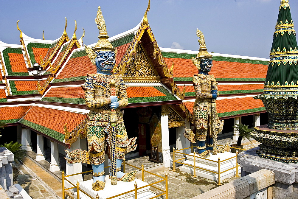 Demon Giant statues guard an entrance to The Grand Palace and Temple Complex, Bangkok, Thailand