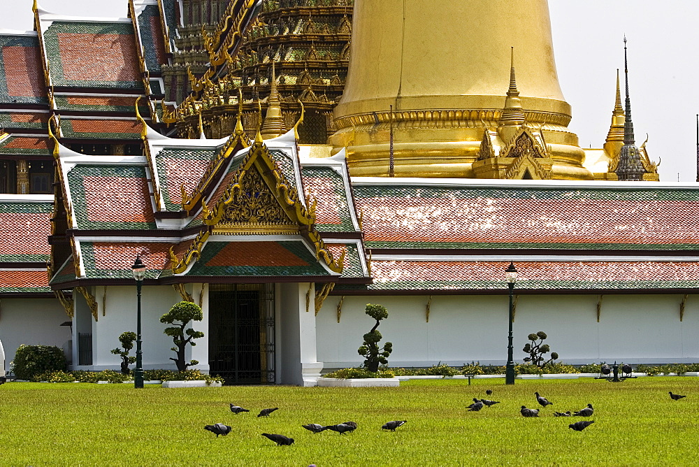 Roofs of the Prasat Phra Thep Bidon and Phra Sri Ratana Chedi, Bangkok, Thailand.