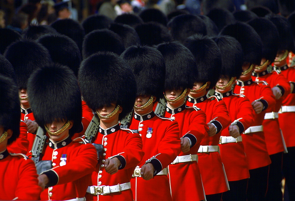 Guards in bearskins march in Windsor, England