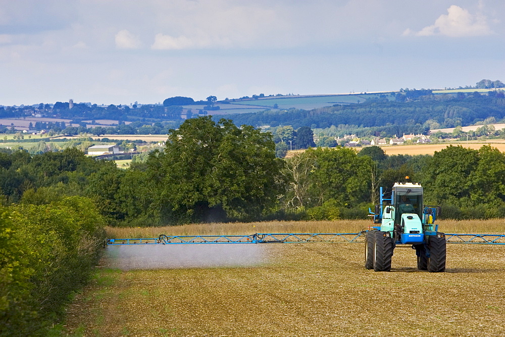 Farmer sprays his crops, Oxfordshire, United Kingdom