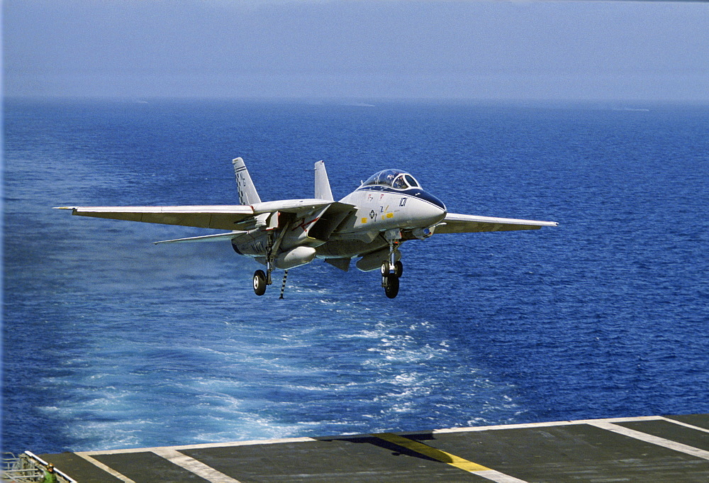 Military airplane returns to USS Nimitz aircraft carrier, Los Angeles,  USA.