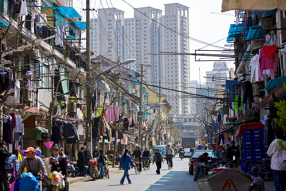 Busy street scene in Zi Zhong Road, old French Concession Quarter in Shanghai, China