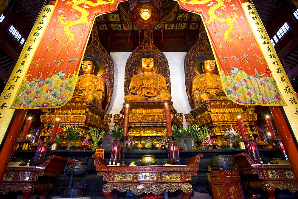 Golden Buddhas in the Grand Hall of Magnificence of the Jade Buddha Temple, Shanghai, China