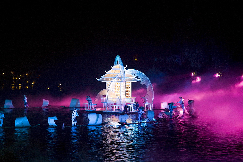 Members of the Impression Sanjie Liu performing a light and sound show directed by Zhang Yimou, Yangsuo, China