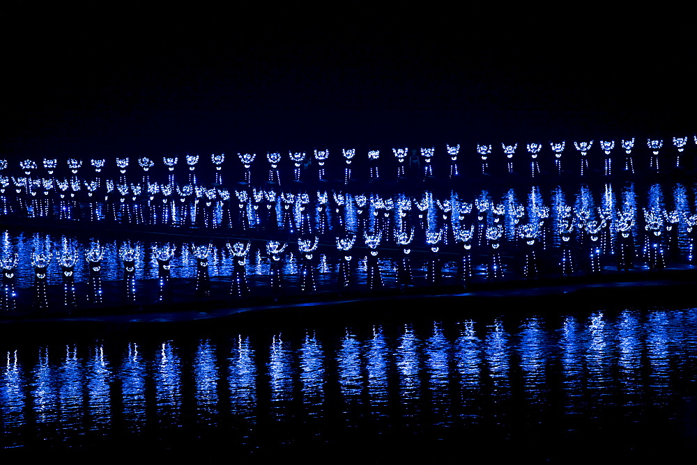 Members of the Impression Sanjie Liu performing a light and sound show directed by Zhang Yimou, Yangsuo, China