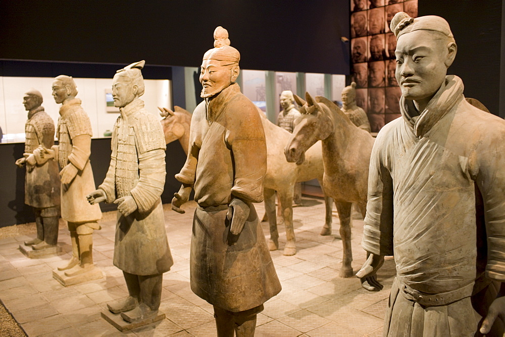 Terracotta warriors and horses on display in the Shaanxi History Museum, Xian, China