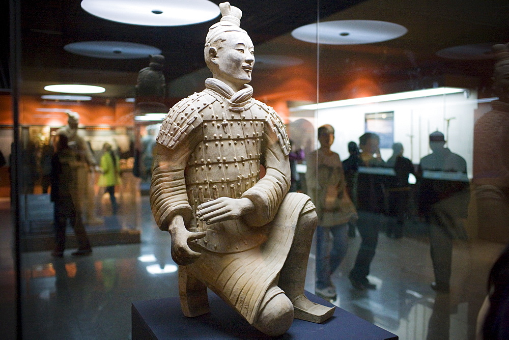 Archer warrior, the only figure found intact from Pit 2, in the Charriots Exhibiton Hall at the Main site, Xian, China