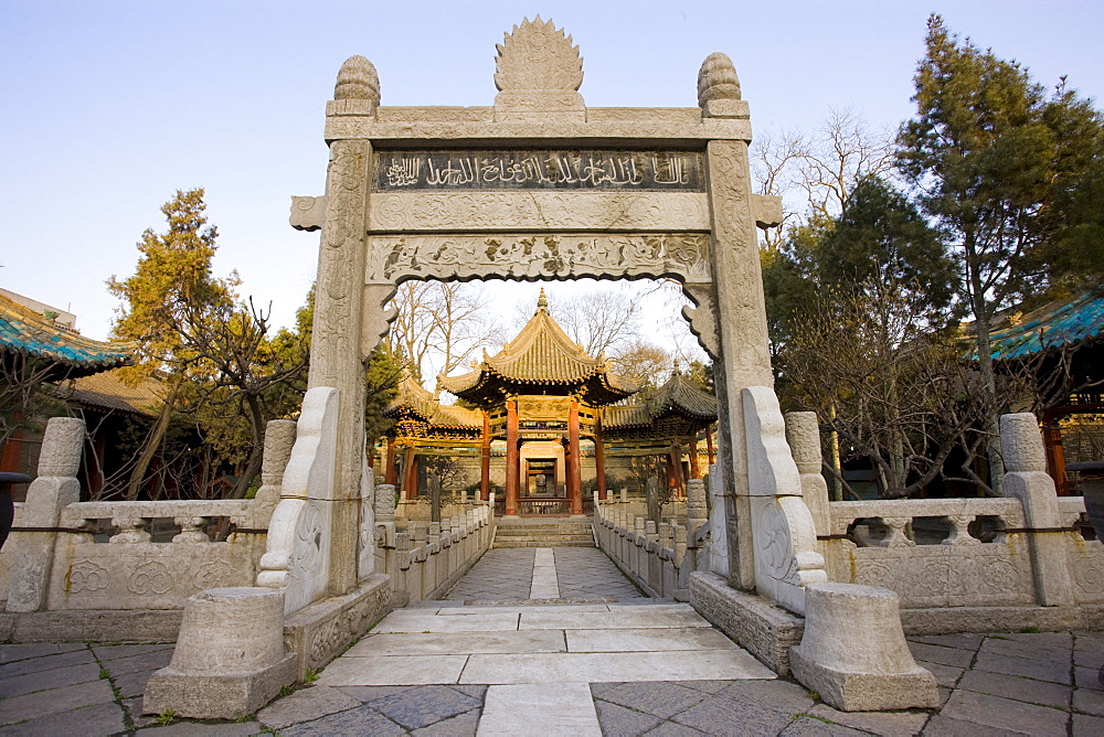 Stone Memorial Gateway leading to the Phoenix Pavilion at the Great Mosque in the Muslim area of Xian, China