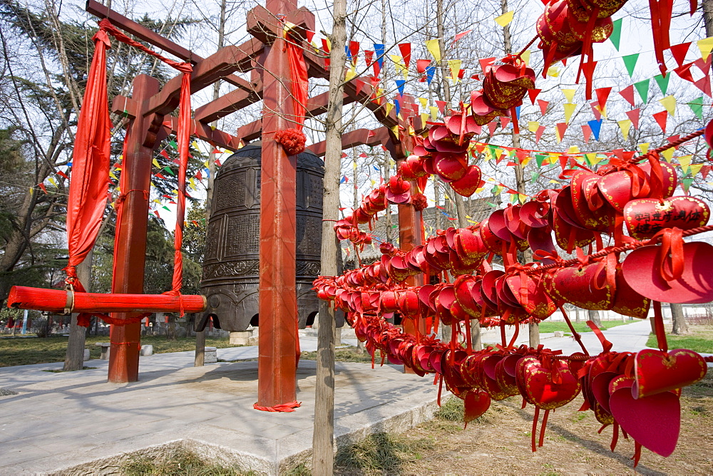 Prayers wishes and greetings tied by the Buddhist morning prayer bell, Small Wild Goose Pagoda, Xian, China