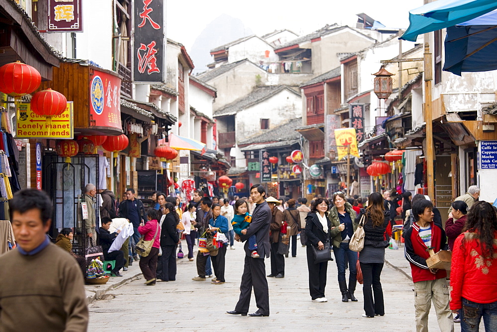 Crowded shopping street in Yangshuo, China