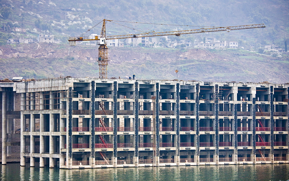 Construction site at new town along the Yangtze River for rehoming residents, China