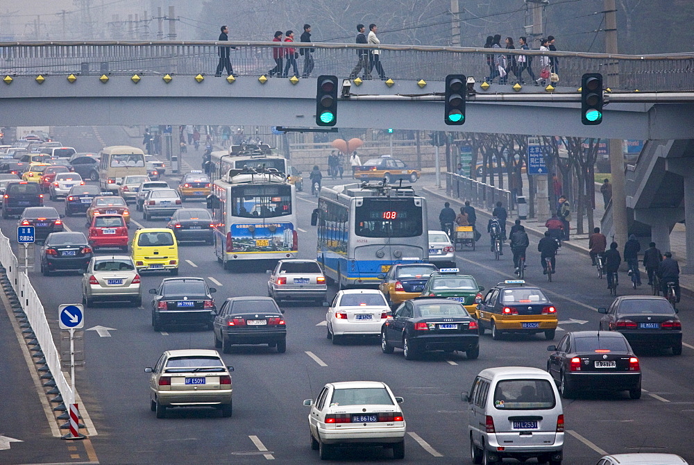 Footbridge over traffic on Beijing main street, China