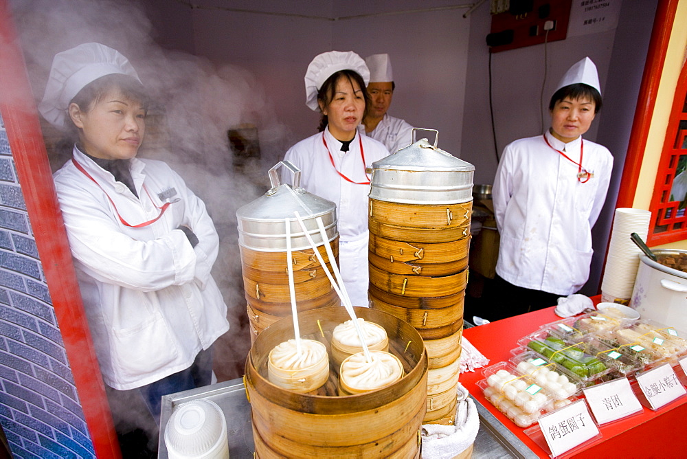 Soup dumplings stall in the Yu Garden Bazaar Market, Shanghai, China