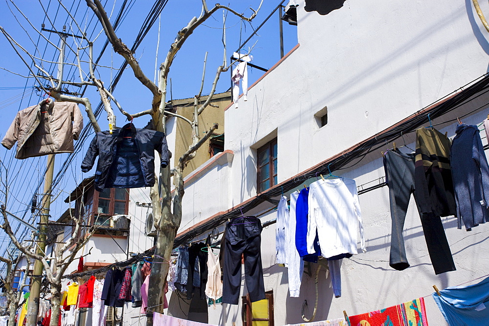 Laundry hanging out to dry in Zi Zhong Road, the old French Concession Quarter of Shanghai, China