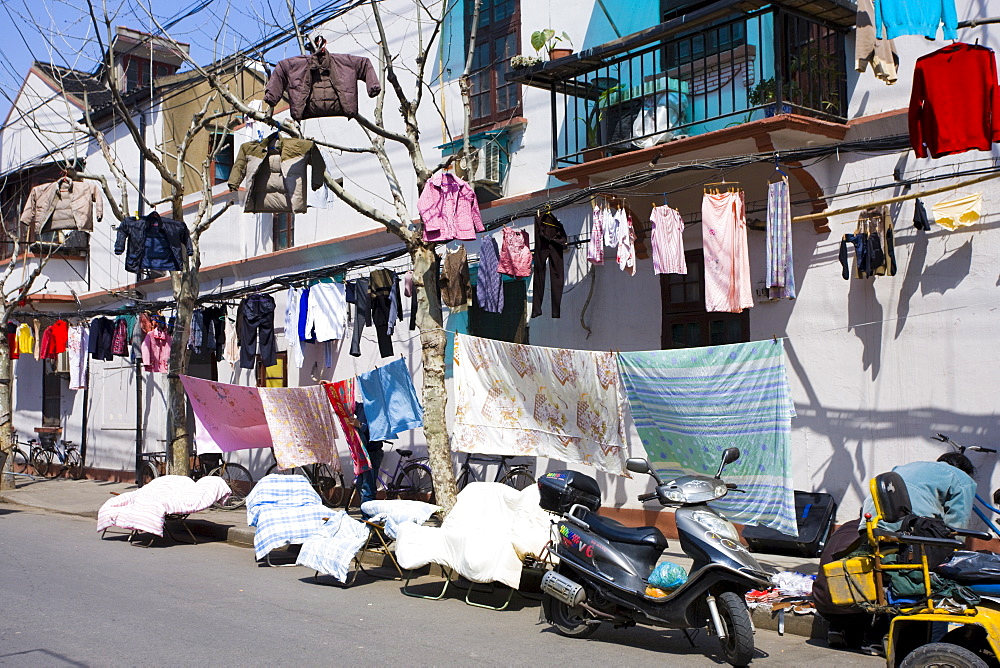 Laundry hanging out to dry in Zi Zhong Road, the old French Concession Quarter of Shanghai, China