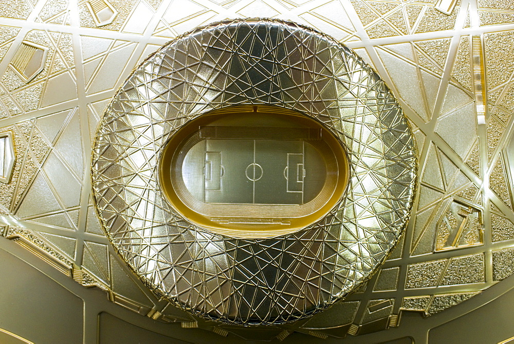 2008 Olympic Games gold Bird's Nest Stadium model in souvenir shop, Wangfujing Street, Beijing, China