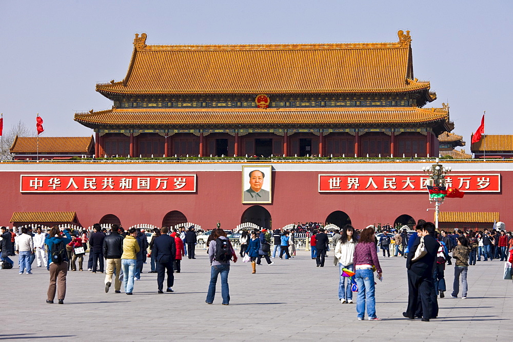 Tourists at Gate of Heavenly Peace with Chairman Mao's portrait, Entrance to the Forbidden City, Beijing, China