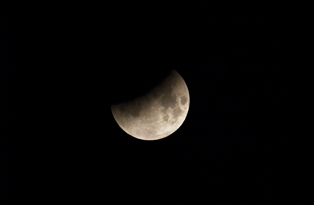 Eclipse of the moon which occurred as a full lunar eclipse viewed just before midnight on the night of 8th/9th November 2003  in Southern England