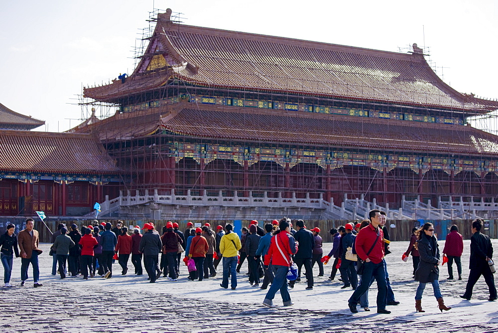 Tourists at Gate of Supreme Harmony which is undergoing renovation work, in the Forbidden City, Beijing, China