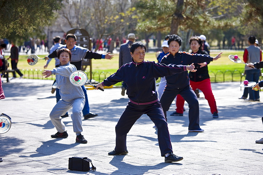 Tai chi with bat and ball in park of the Temple of Heaven, Beijing, China