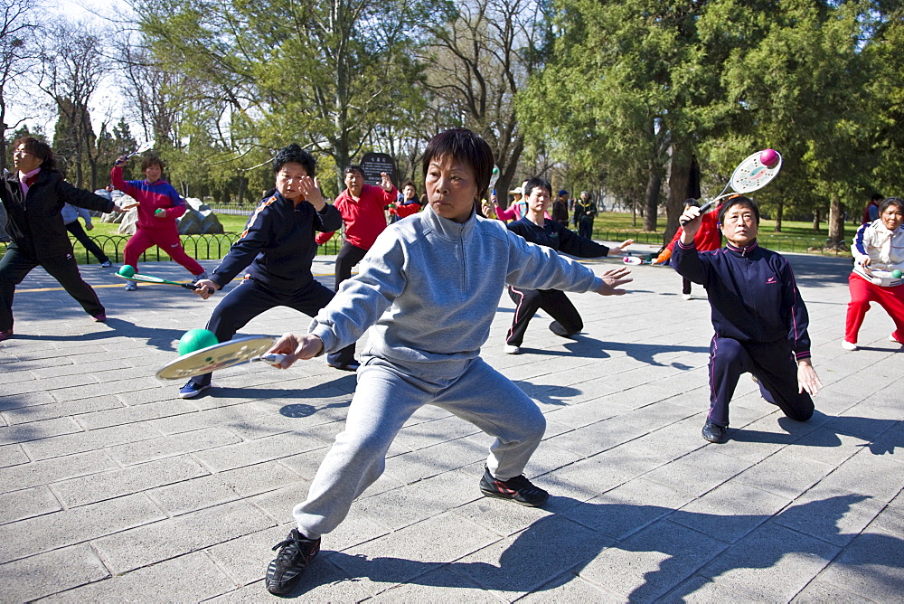 Tai chi with bat and ball in park of the Temple of Heaven, Beijing, China