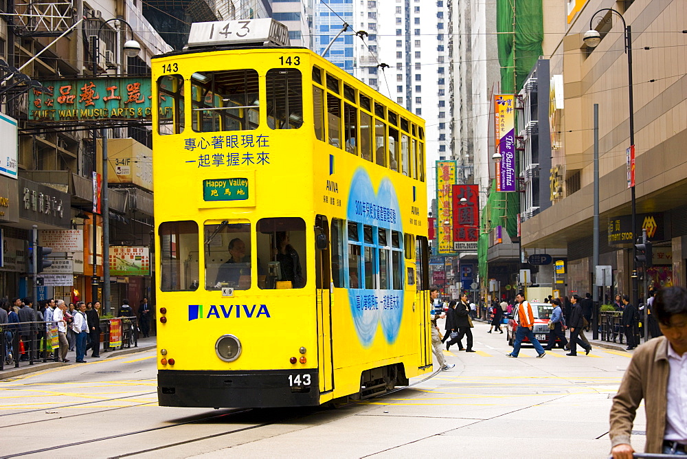 Tram in traditional old Chinese district, Des Voeux Road, Sheung Wan, Hong Kong Island, China