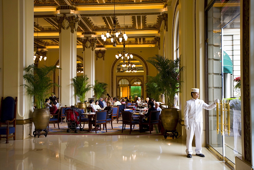 Guests enjoy high tea at the Peninsula Hotel, Hong Kong, China