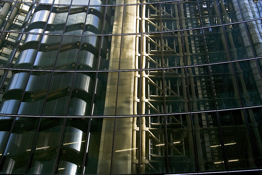 The Lloyd's Building reflected in the windows of The Willis Building, London, England, United Kingdom