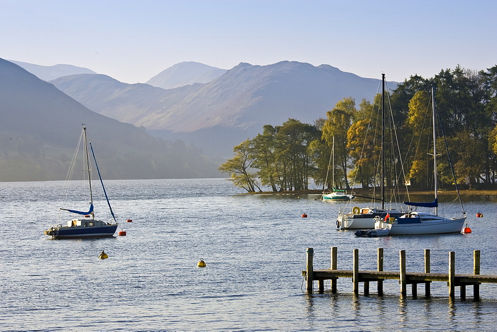 Sailing boats on Lake Ullswater, Lake District, England, United Kingdom