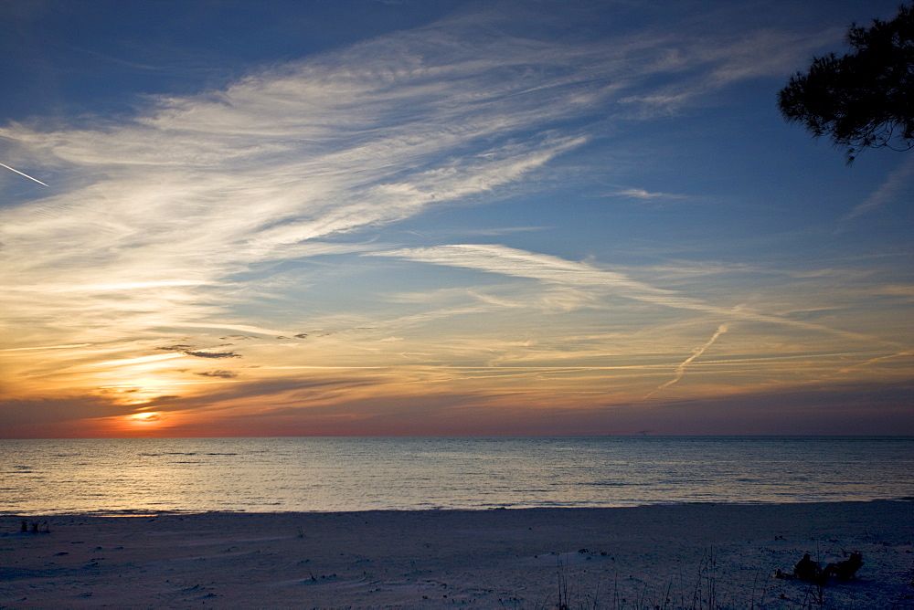 Idyllic shoreline and sandy beach at sunset on Anna Maria Island, Florida, United States of America