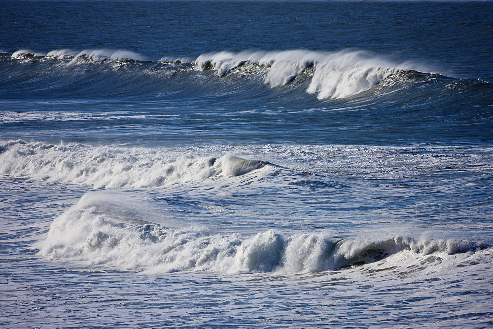 Rolling waves in the sea at Woolacombe, North Devon, UK