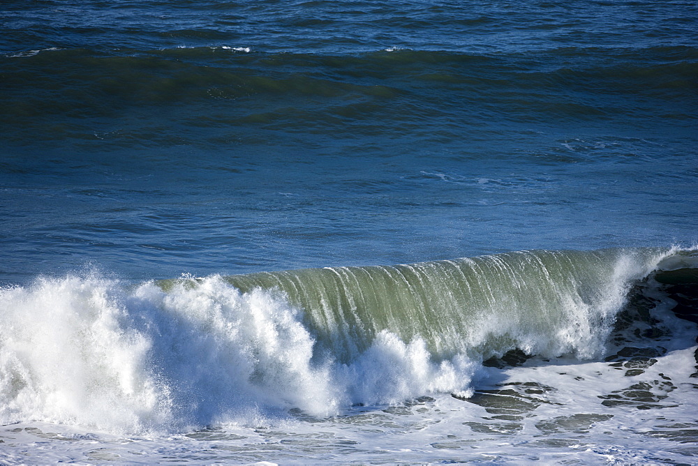 Rolling waves in the sea at Woolacombe, North Devon, UK