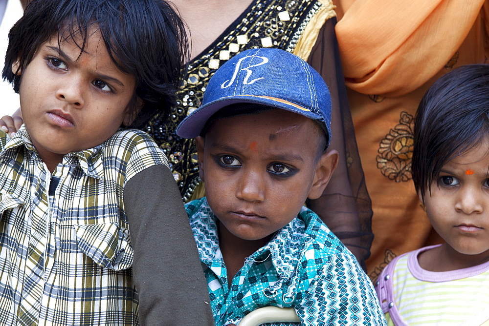 Indian children in back of truck at Mehrauli, New Delhi, India