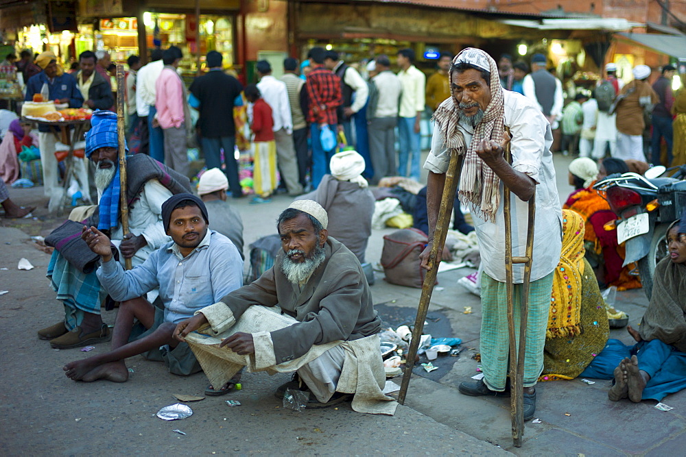 Indian beggars at muslim Meena Bazar, in Old Delhi, India