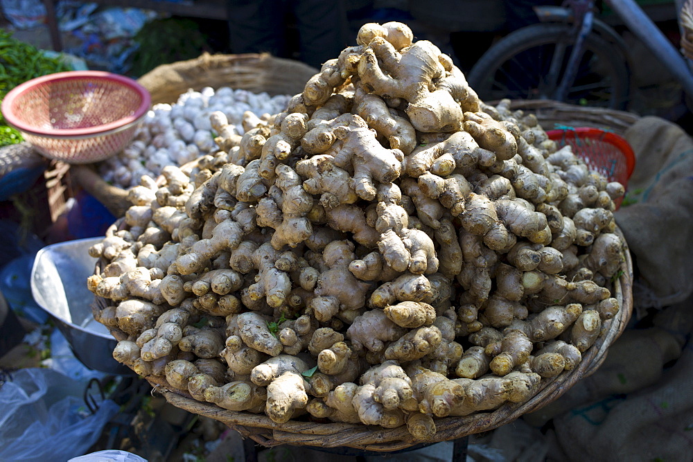 Old Delhi, Daryagang fruit and vegetable market with root ginger on sale, India