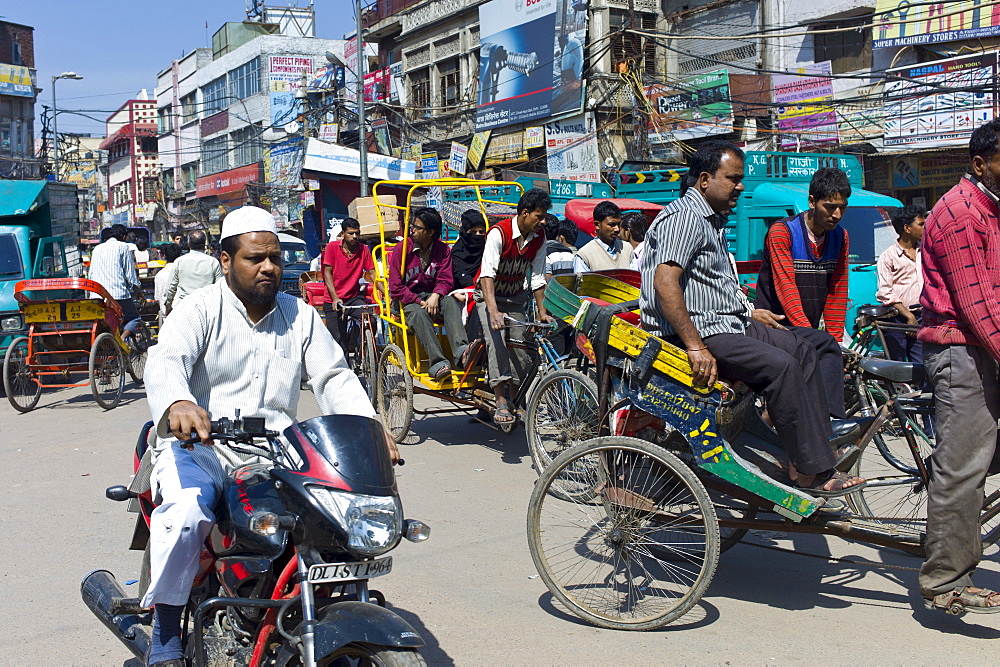 Crowded street scene at Chawri Bazar in Old Delhi, India