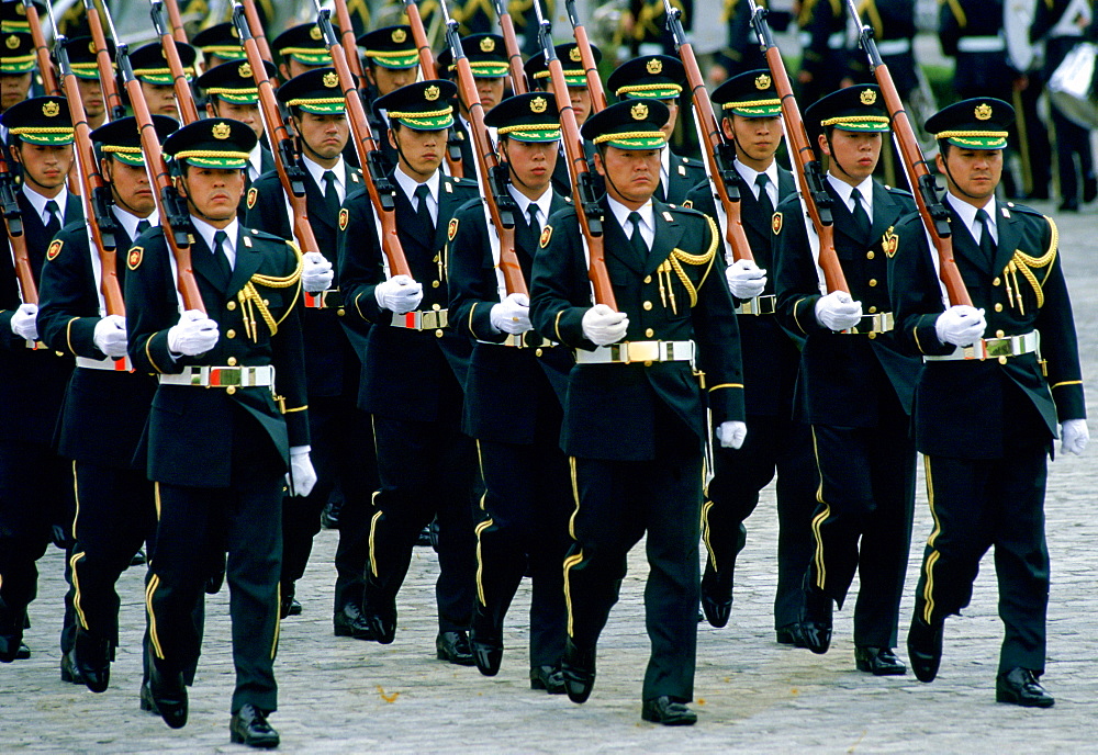 Soldiers marching on parade in Tokyo,  Japan