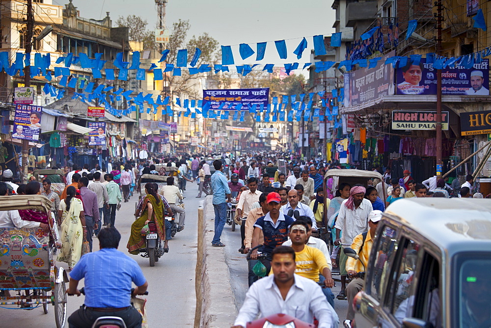 Crowded street scene during holy Festival of Shivaratri in city of Varanasi, Benares, Northern India