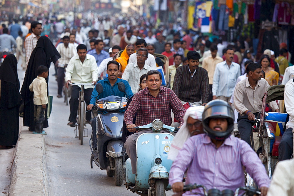 Crowded street scene during holy Festival of Shivaratri in city of Varanasi, Benares, Northern India