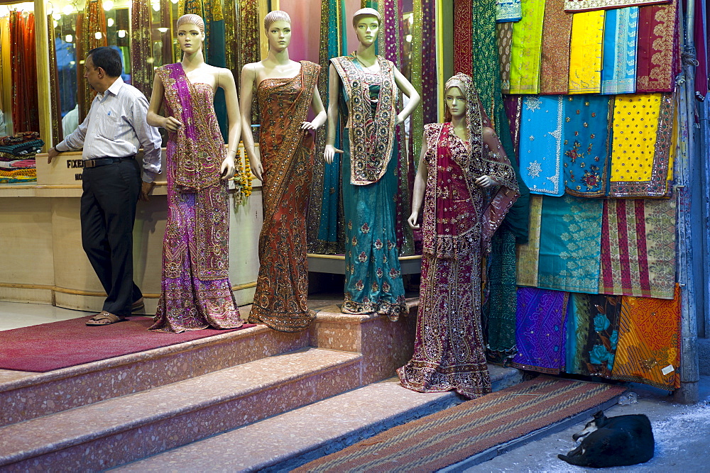 Sari clothes shop in city of Varanasi, Benares, Northern India